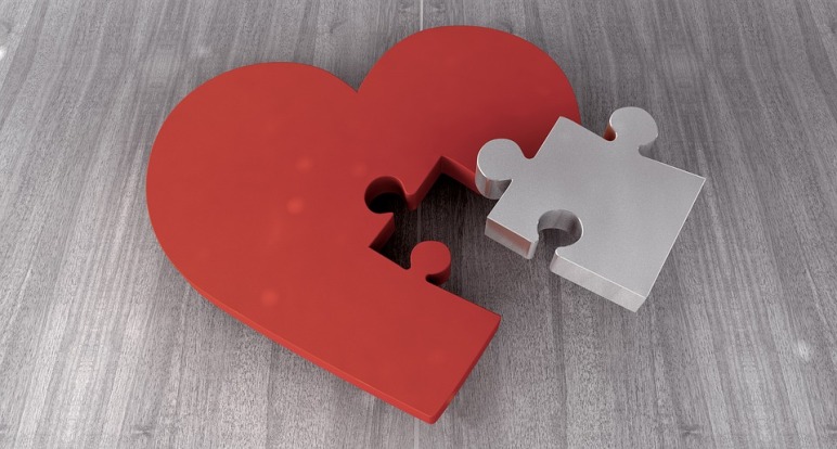 A piece of the heart is separated as a jigsaw puzzle.